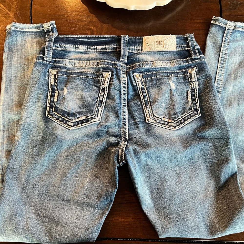 *Miss Me Skinny Mid-Rise Jeans**
